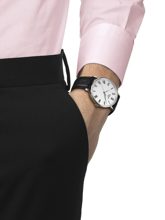 Tissot Men's Classic Analog Watch: Black Leather Strap, White Roman Dial